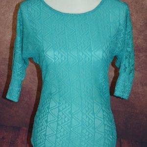 Blue formfitting blouse